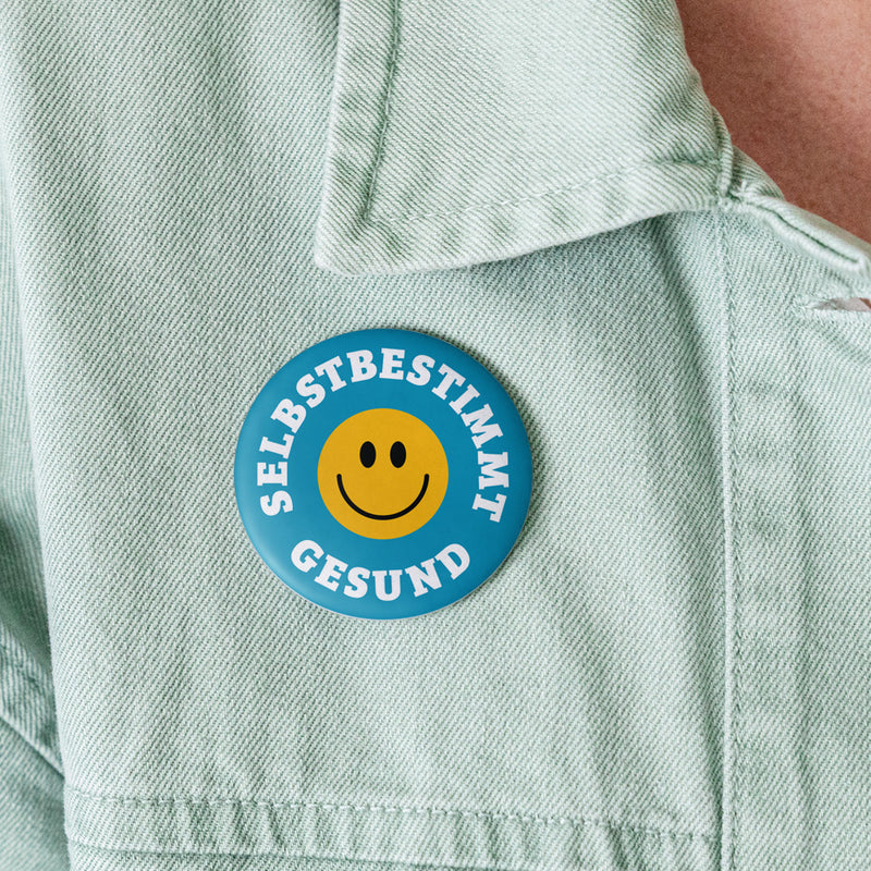 "SELBSTBESTIMMT GESUND" Buttons groß 56 mm (5er Pack)